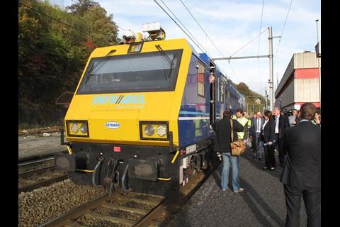 Transport Minister Jacqueline Galant boarding the Infrabel ETCS test car at Dinant, accompanied by SNCB CEO Jo Cornu. Photo: Harry Hondius.